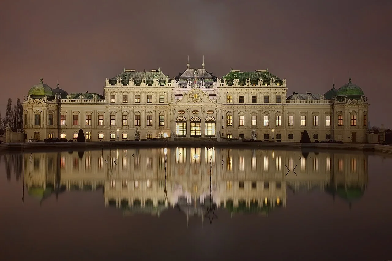 Illuminated Upper Belvedere and its reflection, Vienna